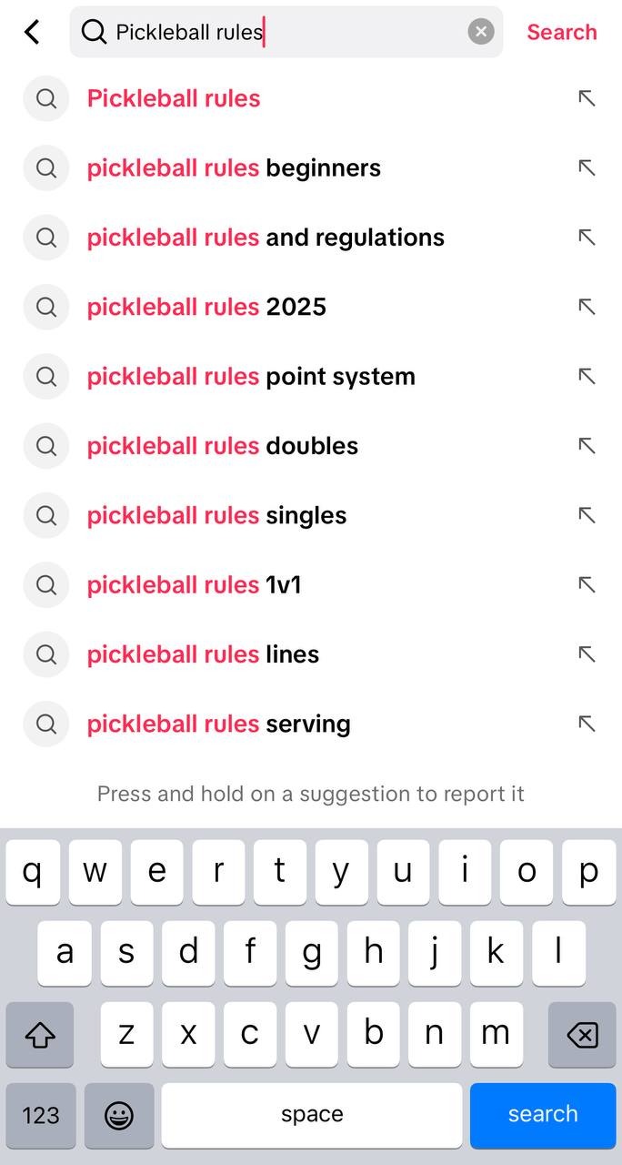 Captura de tela da barra de busca do TikTok mostrando uma busca por "pickleball rules" e as sugestões de buscas relacionadas.